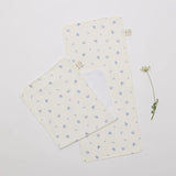 Over the Dandelions Set of 2 Burp cloths in Enchanted Garden Print at Cerise. Made from soft muslin and terry cotton so they are super soft of bbys skin.  These burp cloths are a great neborn baby gift.