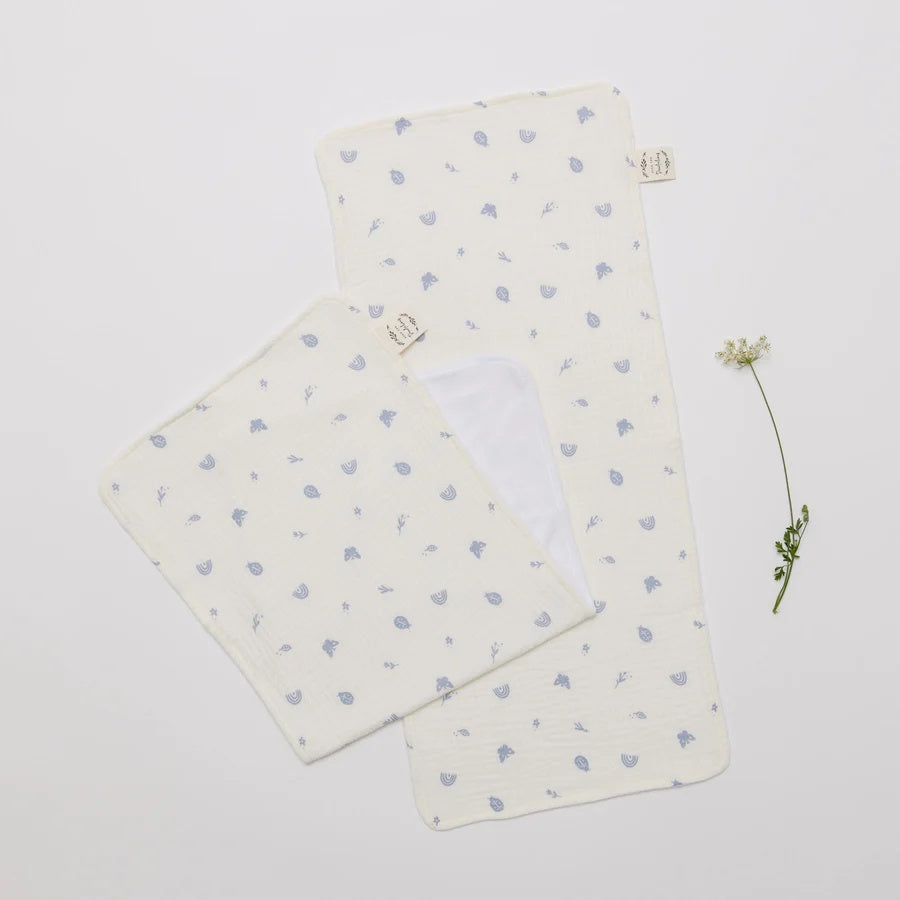 Over the Dandelions Set of 2 Burp cloths in Enchanted Garden Print at Cerise. Made from soft muslin and terry cotton so they are super soft of bbys skin.  These burp cloths are a great neborn baby gift.