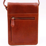 Brown leather crossbody bag on a white background
