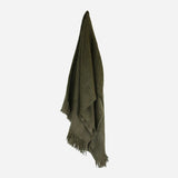 CC Interiors Otago Green Throw at Cerise.  Made from 100% acrylic with a brushed finish and fringed edging detail.  Measures 130cm x 170cm.