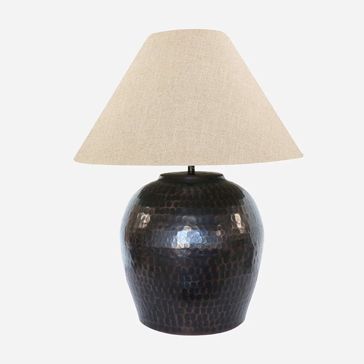 CC Interiors Romo Lampbase shown here with the Biscotti 51cm lamp shade. The shade is sold seperately. Handmade from hand beaten aluminium and finished in an antique bronze colour at Cerise.