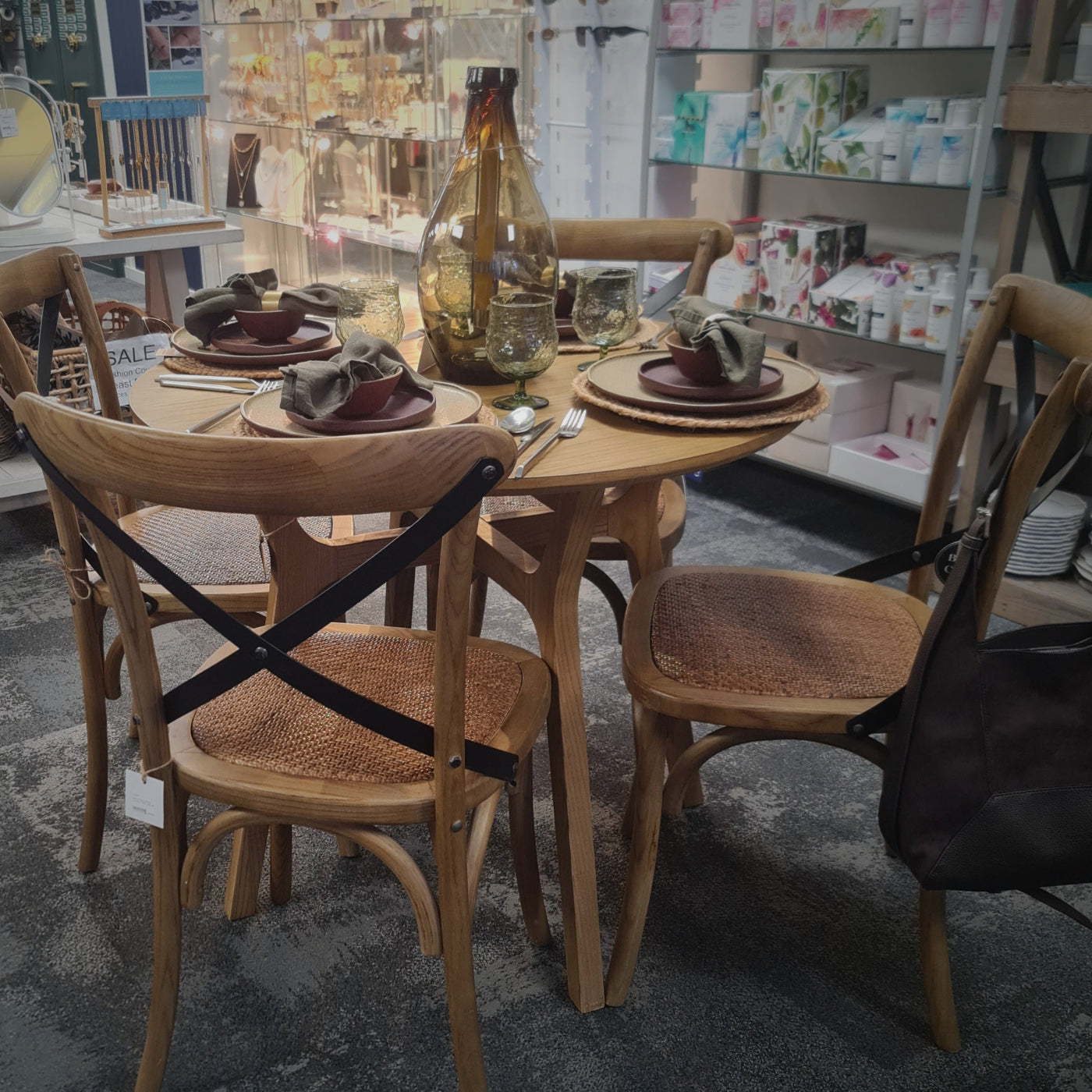 CC Interiors Elm Cross back chairs with round table setting at Cerise in Blenheim NZ.