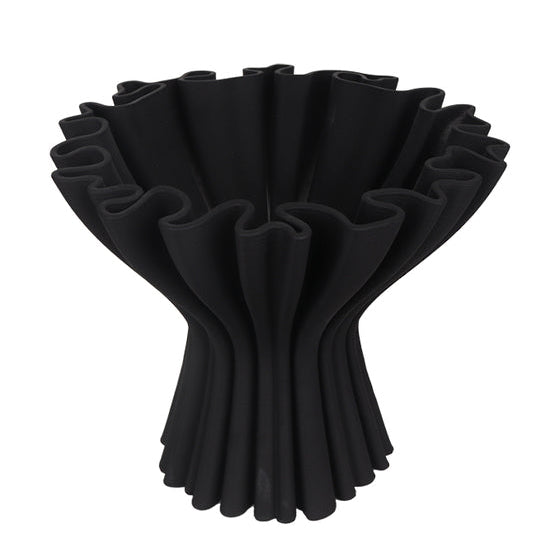 Black vase in a pedestal design with a flared top