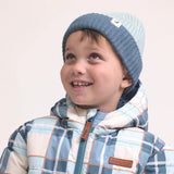 Crywolf Tasman Beanie for children  in Colourblock design availabe in  blue colour at Cerise. Its slimline, no-pom design layers easily under hoods and fits comfortably beneath bike and snow helmets. Made from super-soft Polylana® recyclable fibre, so its lightweight to wear but with the comfort of wool.