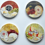 Set f four coasters each featurning a different type of cheese