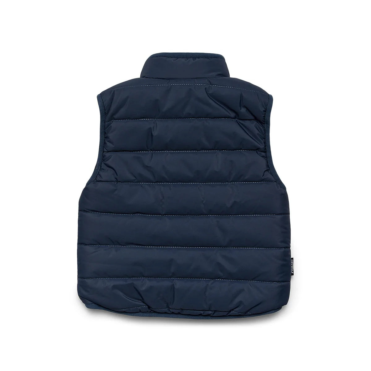 Crywolf reversible Yeti Vest in Ash a navy and natural colour block at Cerise. Reverses from colour block pattern on sherpa fleece side to navy on recycled polyester puffer side.