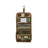  The Crywolf Hanging Toiletry Bag in Field Plaid design at Cerise. Makes the perfect travel companion. Made to keep all their bathroom essentials organised on the go, it features a removable mirror, zippered internal mesh pockets, multiple compartments, and a convenient hanging hook. Made from durable, water-resistant fabric 