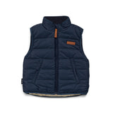 Recycled Polyester front side of Crywolf reversible Yeti Vest in Ash a navy and natural colour block at Cerise. Reverses from colour block pattern on sherpa fleece side to navy on recycled polyester puffer side.