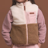 Crywolf reversible Yeti Vest in Harvest soft pink colour at Cerise. Reverses from colour block pattern on sherpa fleece side to soft pink on recycled polyester puffer side.