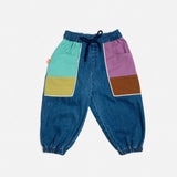 Das Ist Maurice Denim Barrel pants with colour blocked pockets. Feature an elastic waist with drawstring and elastic cuffs at Cerise
