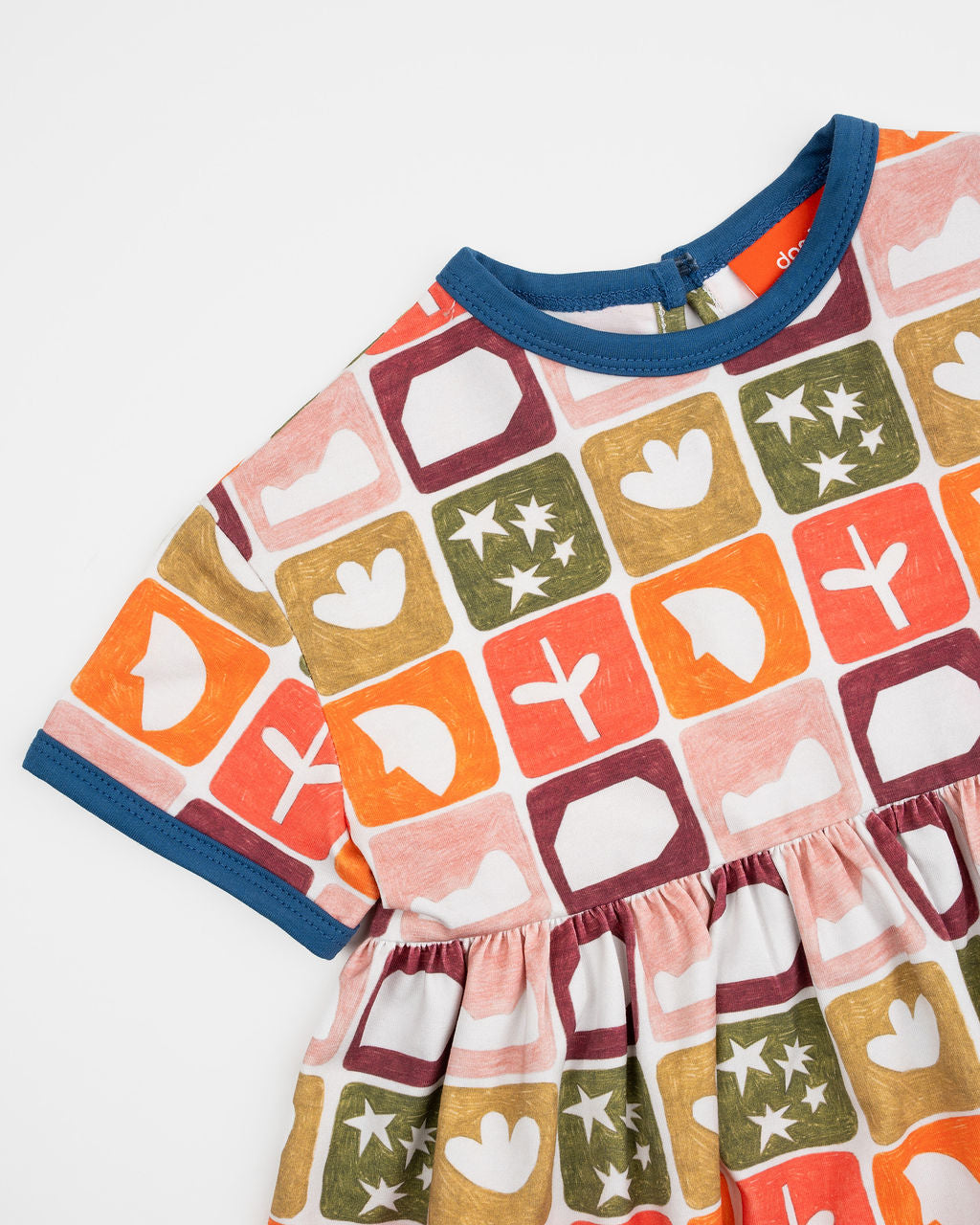 Das Ist Maurice Empire Dress in Midnight Memory print at Cerise. Featuring an exclusive geometric print inspired by treasured moments and nostalgic patterns, the Midnight Memory Dress brings a distinctive, artistic feel to a classic kids’ silhouette. The empire waist creates a relaxed, flowing shape, while the gathered skirt adds movement and plenty of room for little ones to twirl, play and explore.