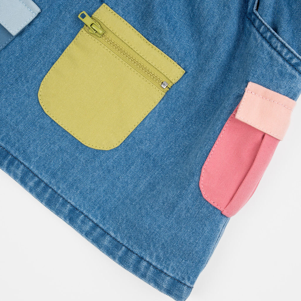 Das Ist Maurice Skirt with Pockets at  Cerise.  Blue Denim Skirt for kids with colourful patch pockets and etail. Elastic waist and drawstring.