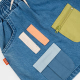 Das Ist Maurice Skirt with Pockets at  Cerise.  Blue Denim Skirt for kids with colourful patch pockets and etail. Elastic waist and drawstring.