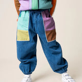 Das Ist Maurice Denim Barrel pants with colour blocked  green, yellow, purple and brown pockets. Feature an elastic waist with drawstring and elastic cuffs at Cerise
