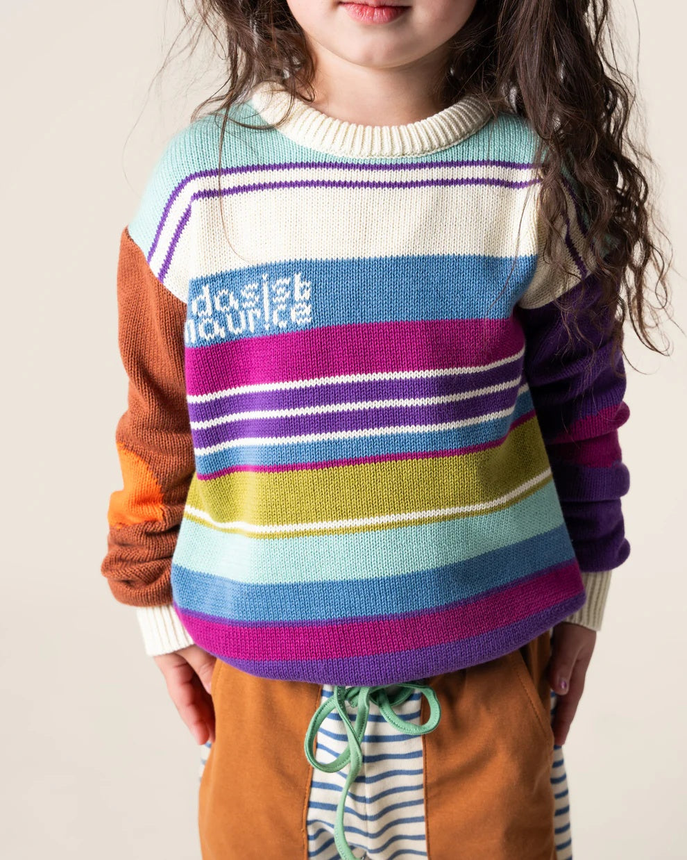 Das Ist Maurice multi coloured  Ski Stripes jersey knit sweater with crew neck, worn with Stripe Wide Pants at Cerise NZ