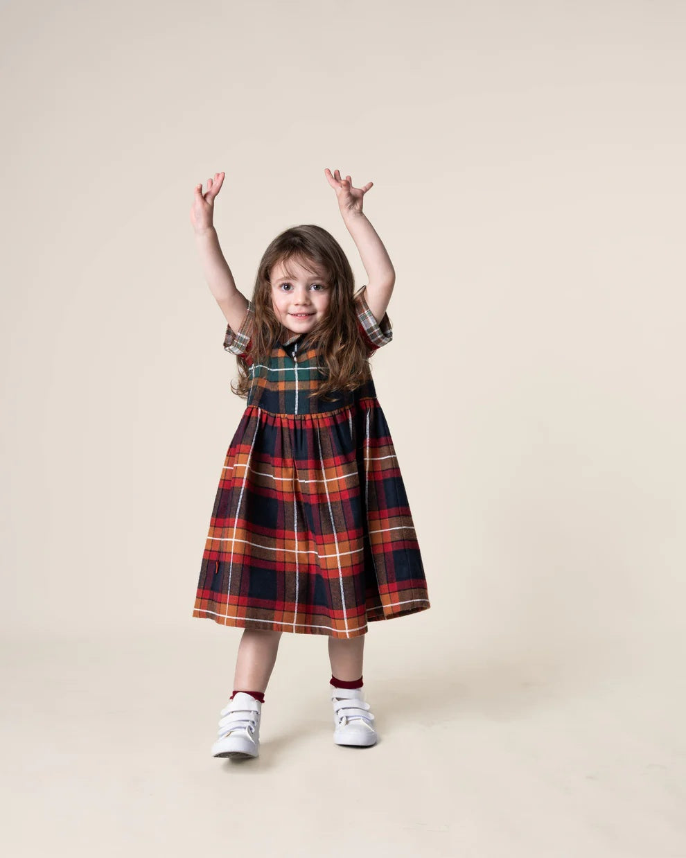 Das Ist Maurice Empire Dress in autumn toned tartan fabric with peter pan colour and short sleeves at Cerise