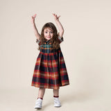 Das Ist Maurice Empire Dress in autumn toned tartan fabric with peter pan colour and short sleeves at Cerise