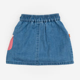 Das Ist Maurice Skirt with Pockets at  Cerise.  Blue Denim Skirt for kids with colourful patch pockets and etail. Elastic waist and drawstring.