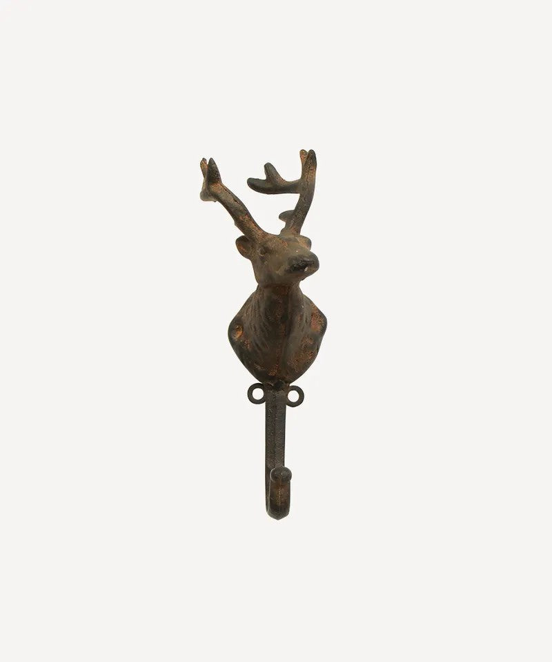 Decorative wall hook shaped like a deer head on a white background