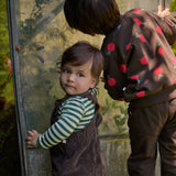 Nature Baby Emerson Sweater in Brown cotton knit with radish print in red and green. Nature Baby  at Ceriseeddy overallin in Pincone colour teamed with Eden stripe Bodysuit at Cerise