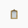 Gold coloured photo frame with floral detail