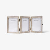 Triple photo frame with decorative antique silver decoractive border on a white background