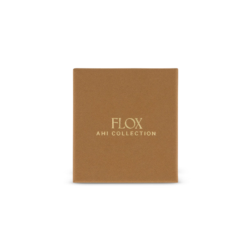 Flox compact mirror in flox distinctive artwork. Opens up to one regular mirror and one magnifying mirror,, Presented in a gift box