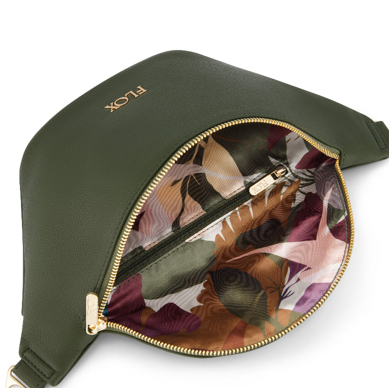FLOX AHI belt bag in green earthy toned textured vegan leather with flox designed satin interior lining and two staps.  Gold Tui Charm