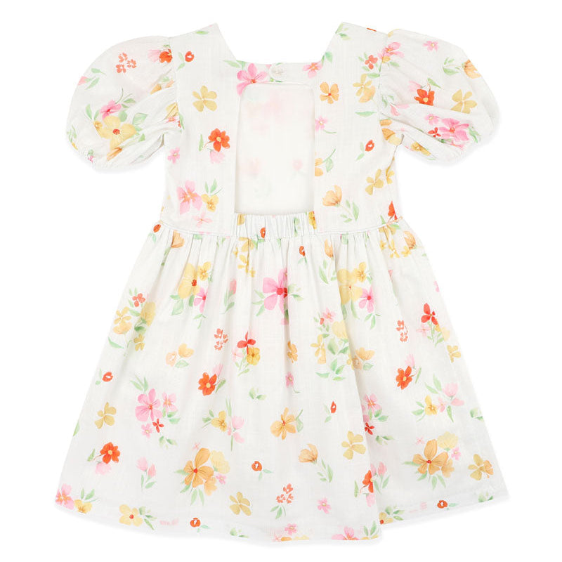 Floral dress on a white cotton fabric with puff sleeves 