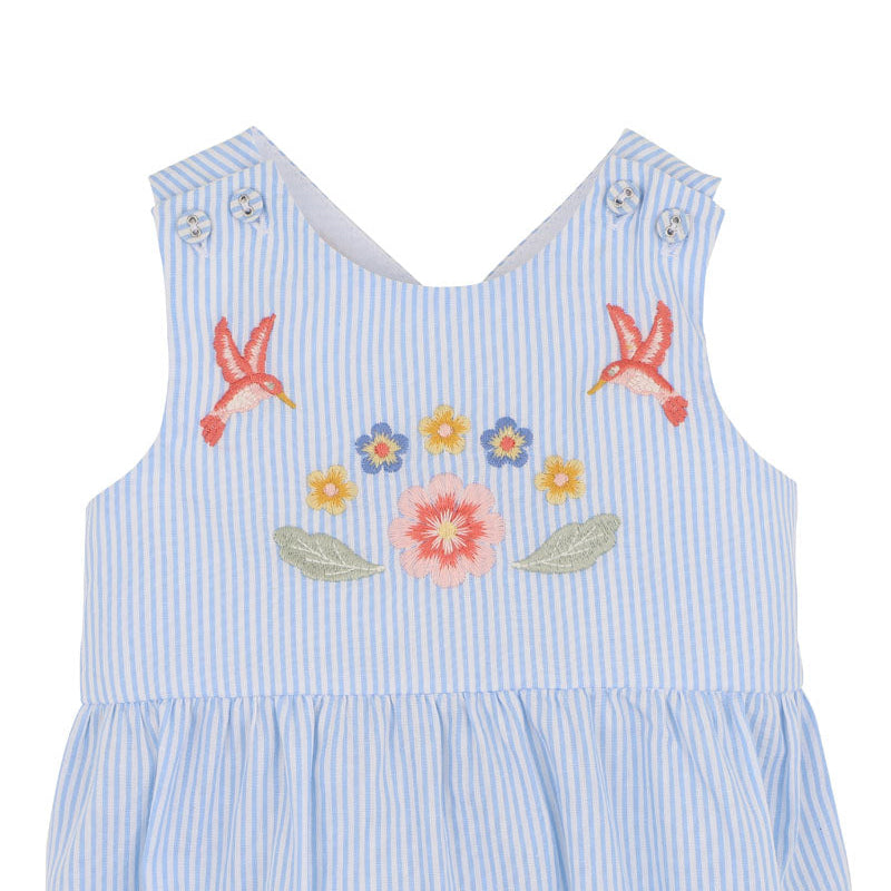 Blue striped dress with floral and starfish embroidery on a white background