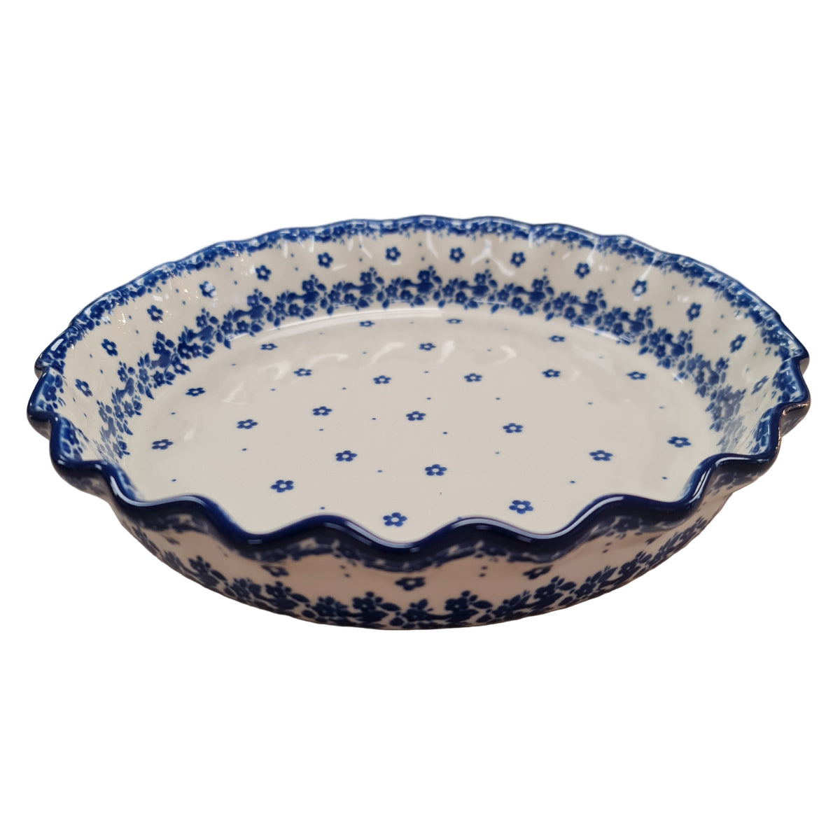 Flared edge round pottery pie dish in a blue and cream ceramic pattern