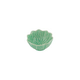 Green ceramic leaf-shaped bowl on a white background
