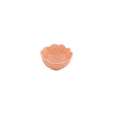 Small pink ceramic bowl on a white background