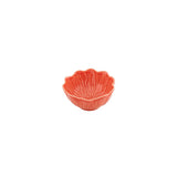 Salmon coloured ceramic shaped bowl on a white background