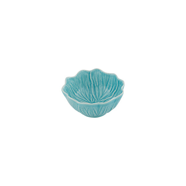 Turquoise ceramic bowl with a textured surface on a white background