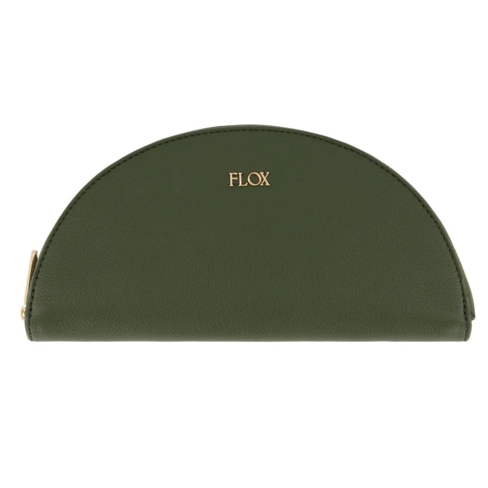 With its slimline profile and wraparound curved zip, the FLOX Antipodes Travel Jewellery Case at Cerise featuring the iconic Flox logo is easy to pack into a suitcase, overnight bag or handbag. It’s a practical and stylish travel accessory for holidays, weekends away or simply keeping your jewellery organised at home.