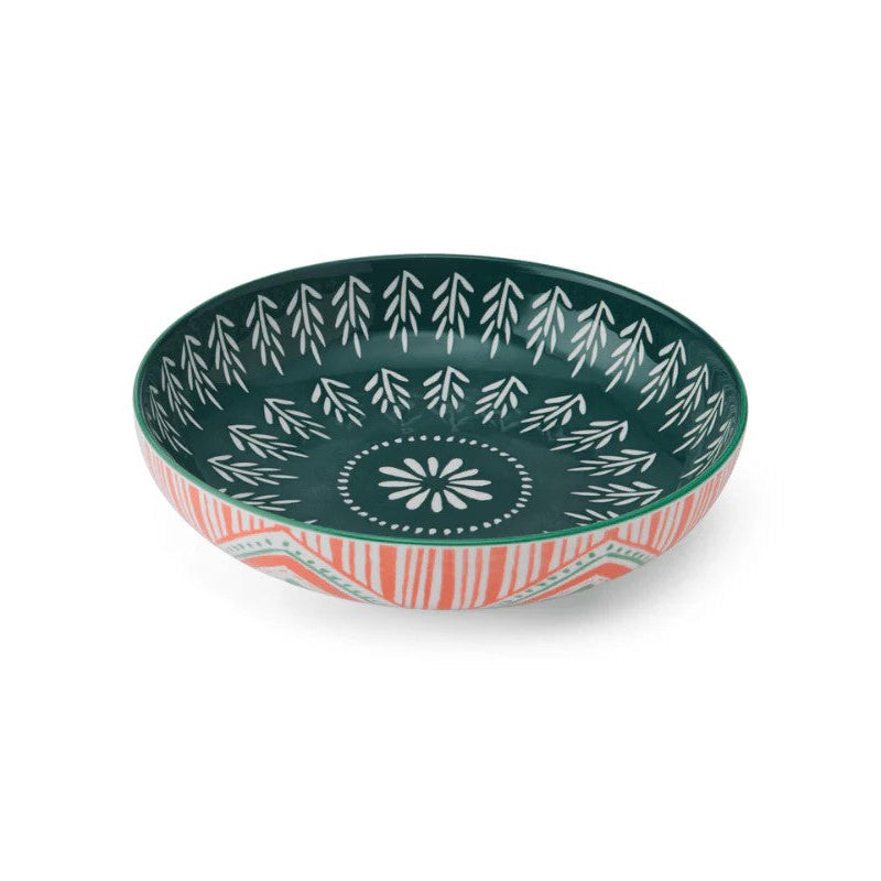 Decorative ceramic bowl with green and white pattern and red and white on a white background