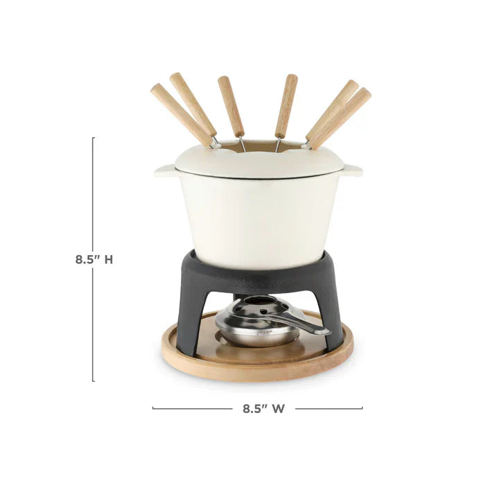 Beige coloroued fondue set on wooden base with wooden handle forks