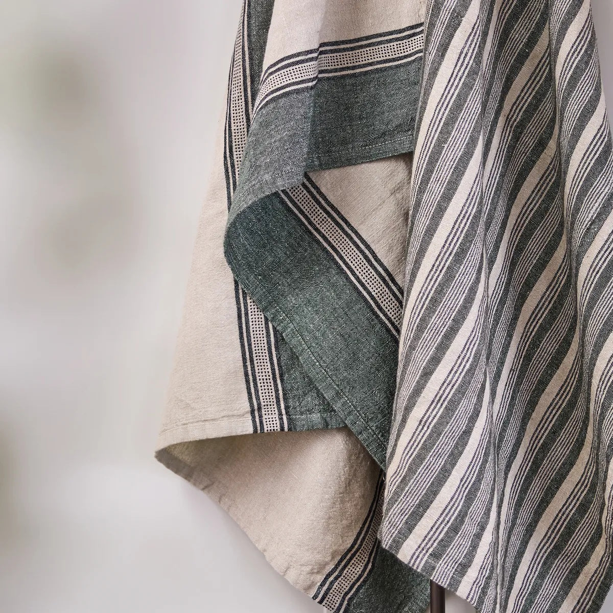 French Country Collections Atelier Ribbon Teatowel in Green at Cerise.  Made from a practical cotton linen blend and has a hang tag.