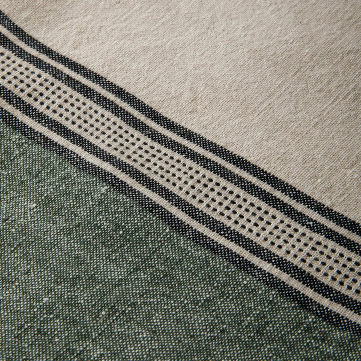 French Country Collections Atelier Ribbon Teatowel in Green at Cerise.  Made from a practical cotton linen blend and has a hang tag.