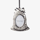 French Country baby’s first Christmas hanging photo frame ornament at Cerise. Featuring an elegant bell shape with delicate detailing and crystal-style accents, it holds a small photo and hangs from a ribbon—perfect for a Christmas tree or nursery keepsake. 
Measures  7.1cmLx9cmWx0.5cmH
