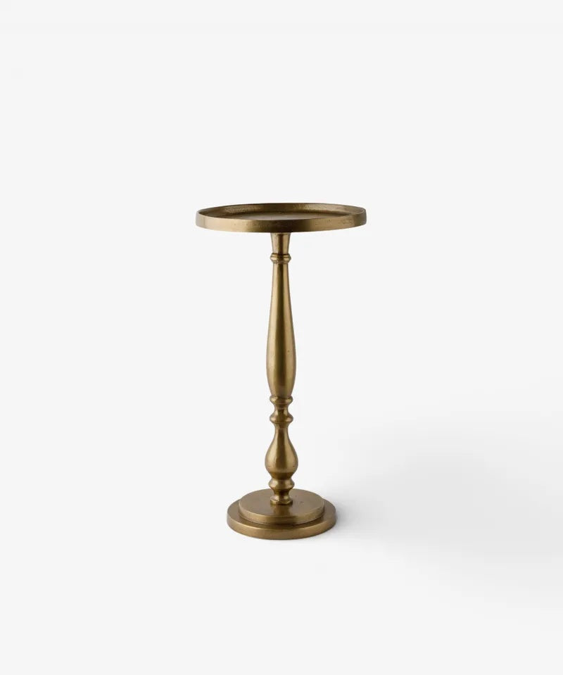 The Barnes Side Table by French Country Collections at Cerise brings timeless elegance to your room with its graceful curved base and practical lipped tabletop.

Made from metal and finished in  antique gold patina, this versatile piece complements both traditional and contemporary interiors, making it the perfect accent beside a sofa, armchair, or bed.

Measures 26cm (L) × 26cm (W) × 50cm (H)