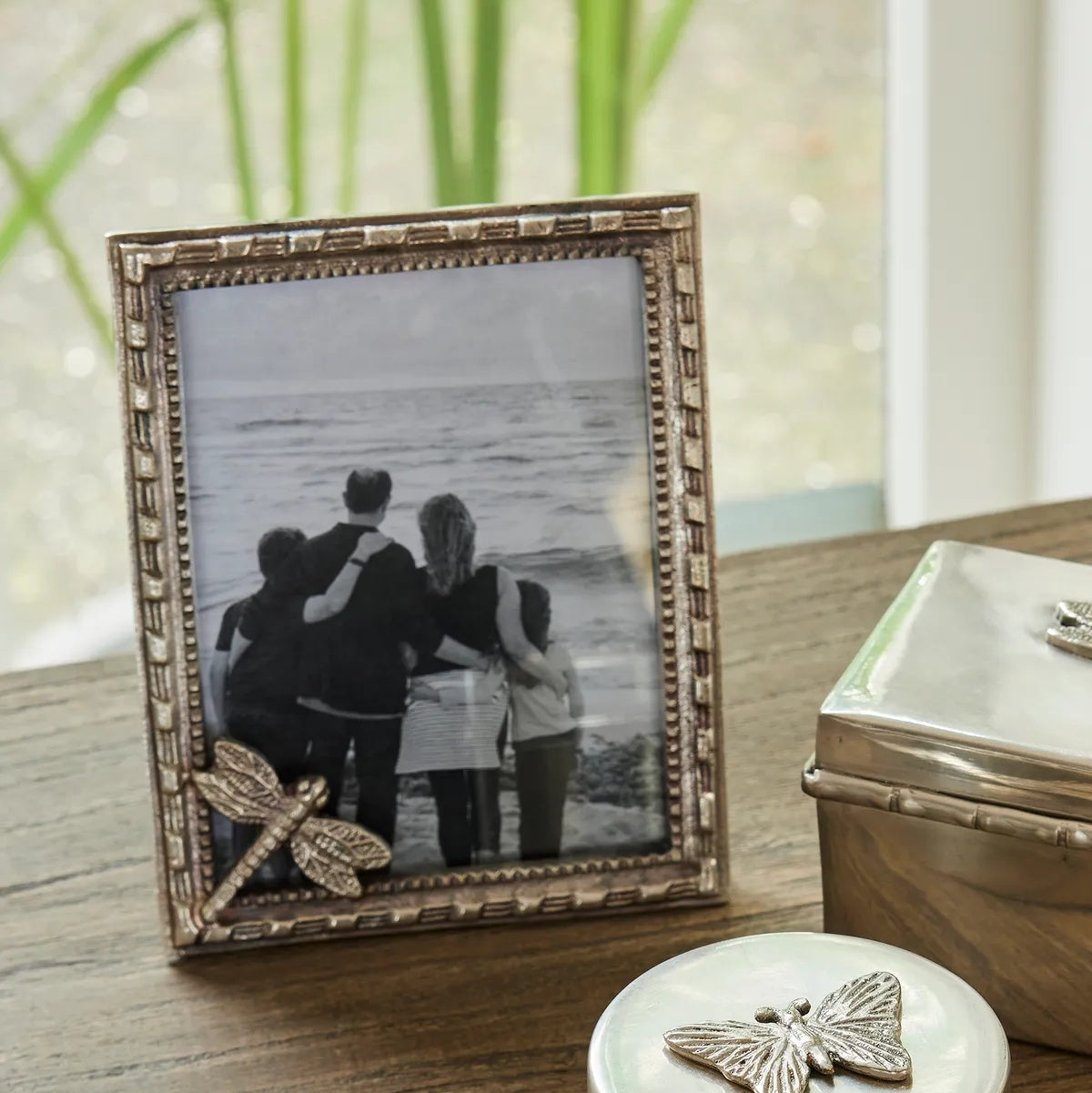 French Country Dragonfly Photo Frame at Cerise.  Made from solid brass with a silver finish.  Holds a 6 x 4 inch photo.
