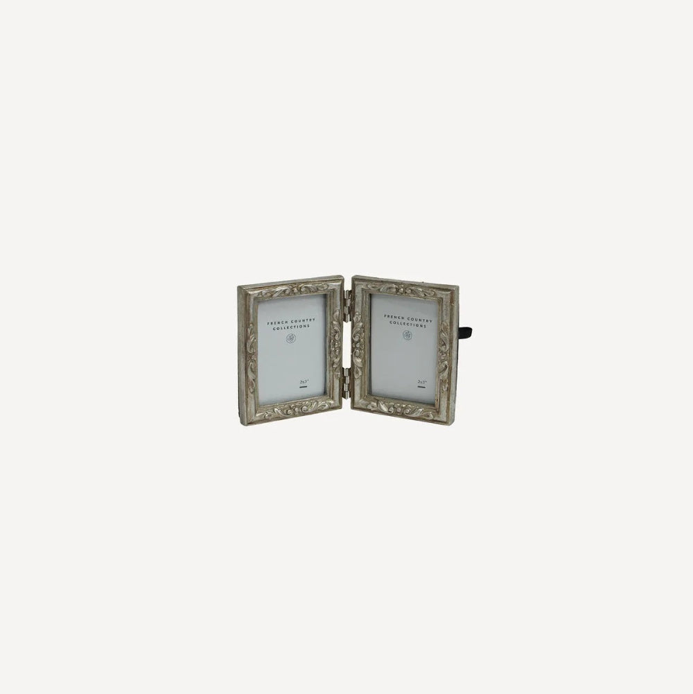 French Country Emma double photo frame at Cerise.  Holds 2 size 2 x 3 inch  photos.   Minished in a silver colour with flower motifs.