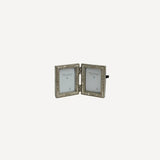 French Country Emma double photo frame at Cerise.  Holds 2 size 2 x 3 inch  photos.   Minished in a silver colour with flower motifs.