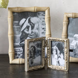 French Country Emma double photo frame at Cerise.  Holds 2 size 2 x 3 inch  photos.   Minished in a silver colour with flower motifs.