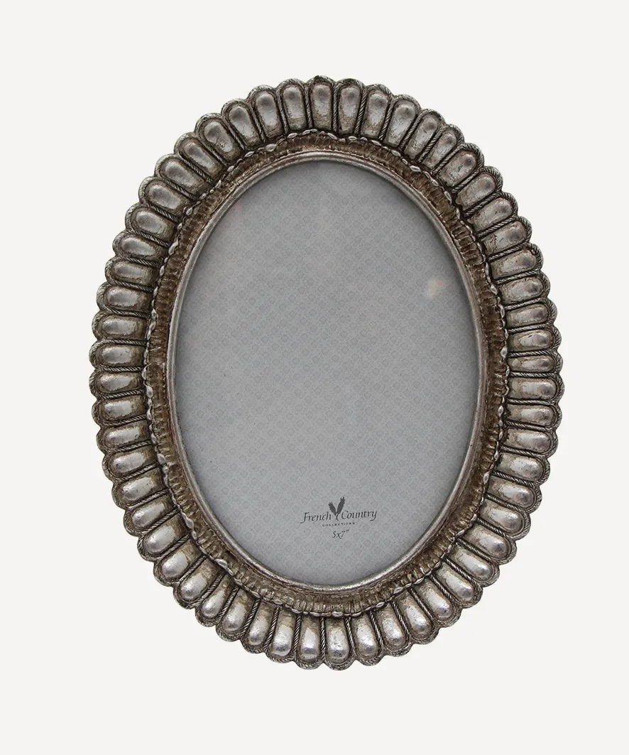 French Country Fanned Oval Photo Frame at Cerise.  Finished in a pewter colour and it holds a 5 x 7 inch photo