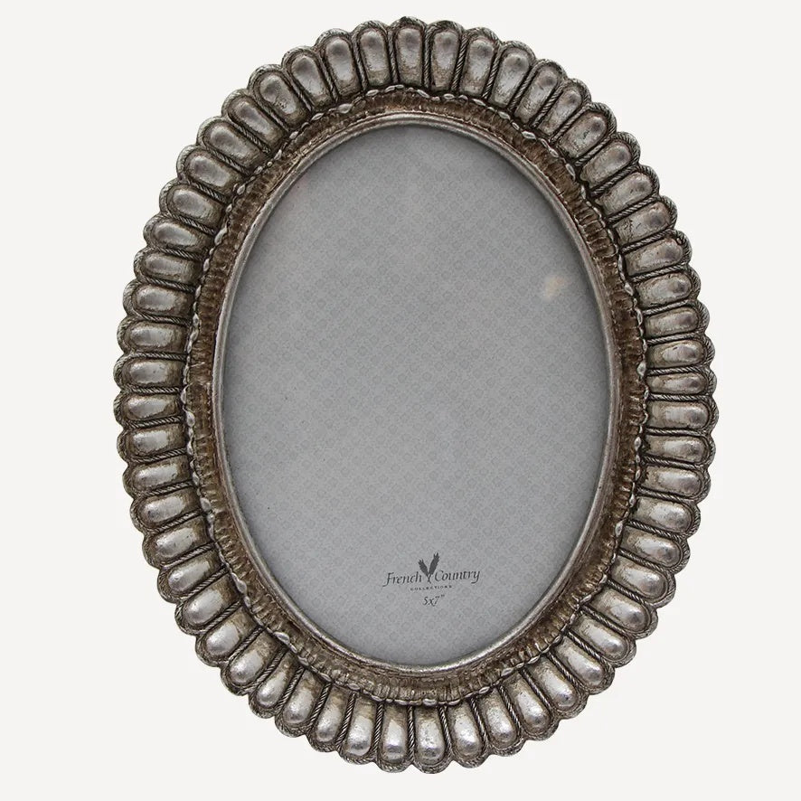 French Country Fanned Oval Photo Frame at Cerise.  Finished in a pewter colour and it holds a 5 x 7 inch photo