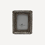French Country small fanned silver photos frame at Cerise.  Holds a 2.5 x 3.5 inch photo.