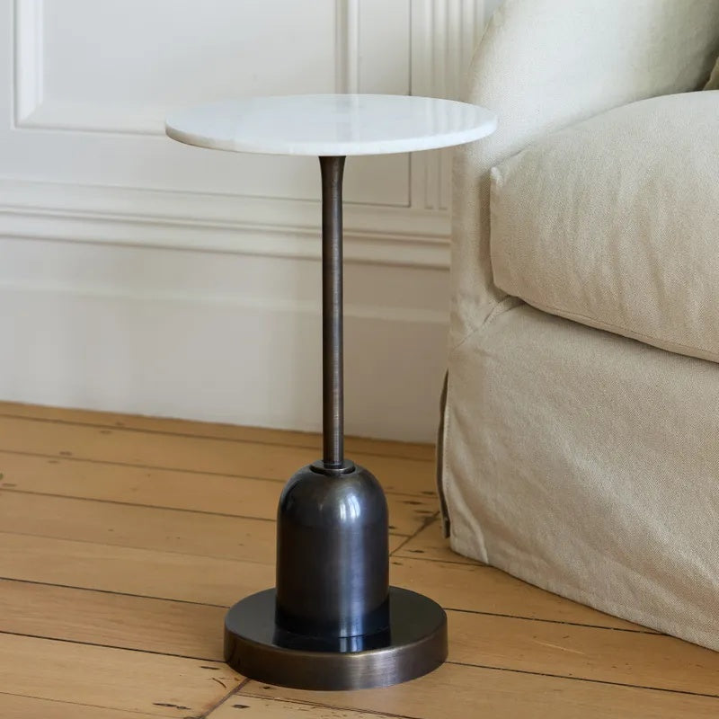 The French Country Collections Finn Side Table at Cerise, combines sleek iron with a luxurious marble top for a refined, mid-century inspired look. A great little side table for the sofa or bedside table.
Measures 30cm (L) × 30cm (W) × 49cm (H)